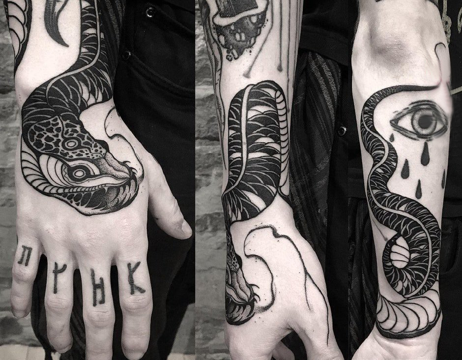 点击大图看下一张：蛇纹身 男生手臂上蛇纹身图片
