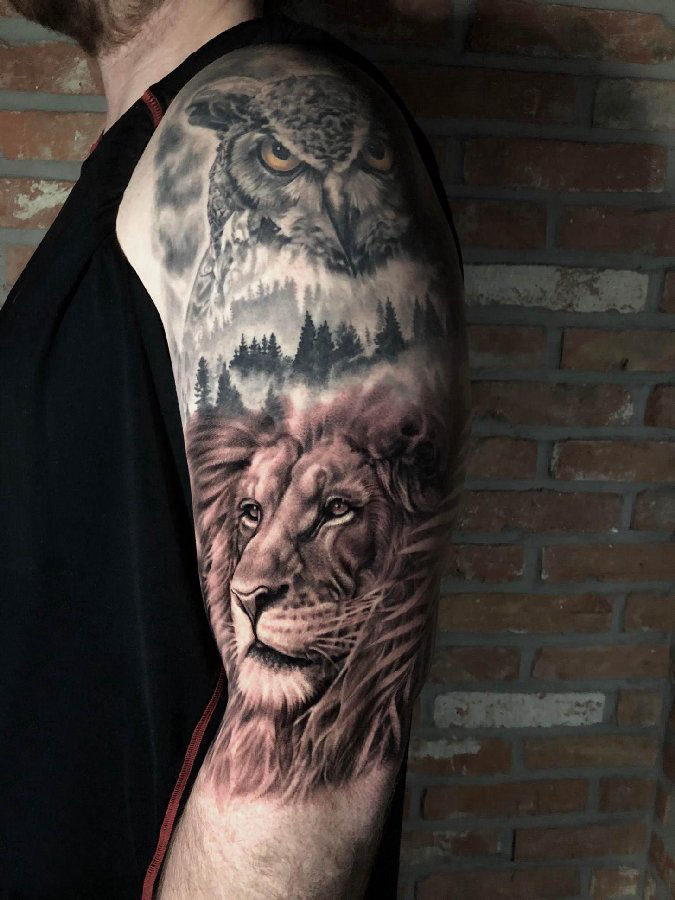 点击大图看下一张：手臂纹身图片 男生手臂上猫头鹰和狮子纹身图片