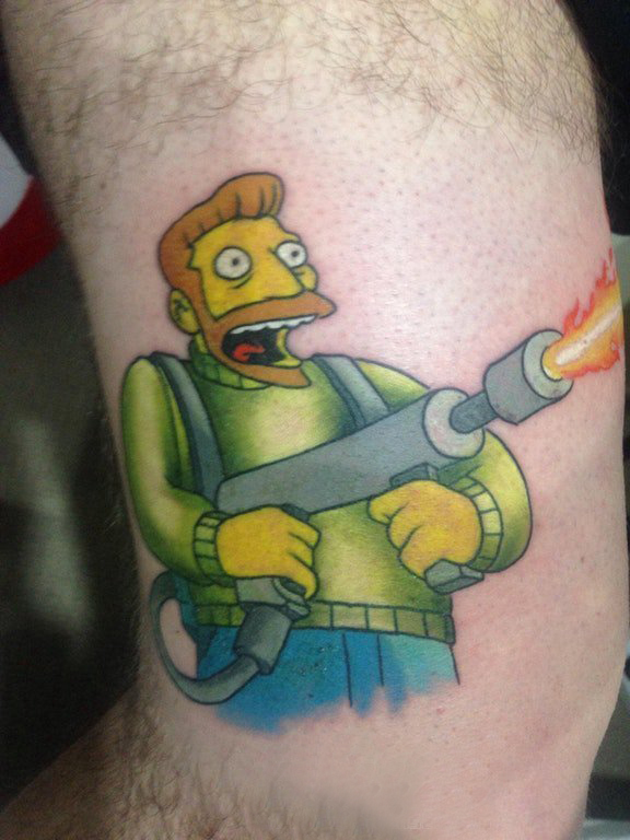 点击大图看下一张：纹身卡通人物  男生手臂上彩色的卡通人物纹身图片