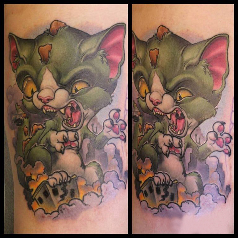 点击大图看下一张：小猫咪纹身 女生手臂上创意的猫咪纹身图片