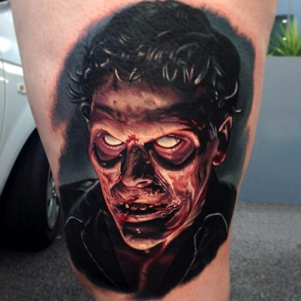点击大图看下一张：人物肖像纹身  男生大腿上写实的人物肖像纹身图片