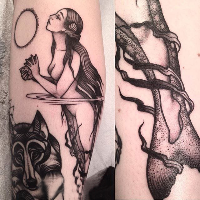 点击大图看下一张：纹身美人鱼  女生手臂上黑灰的美人鱼纹身图片