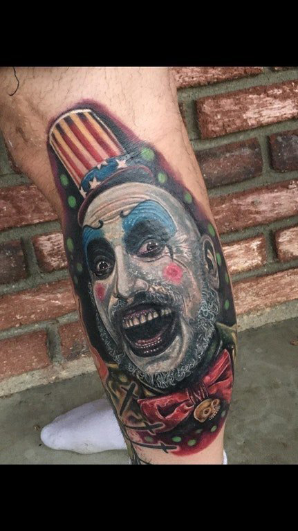 点击大图看下一张：小丑纹身  男生大臂上彩色的纹身小丑纹身图片