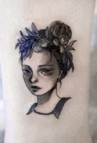 人物肖像纹身 女生小腿上彩色的人物肖像纹身图片