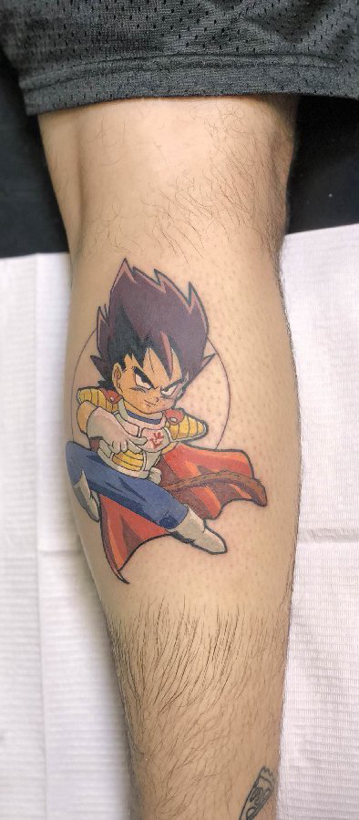 点击大图看下一张：超级赛亚人纹身 男生小腿上可爱的超级赛亚人纹身图片
