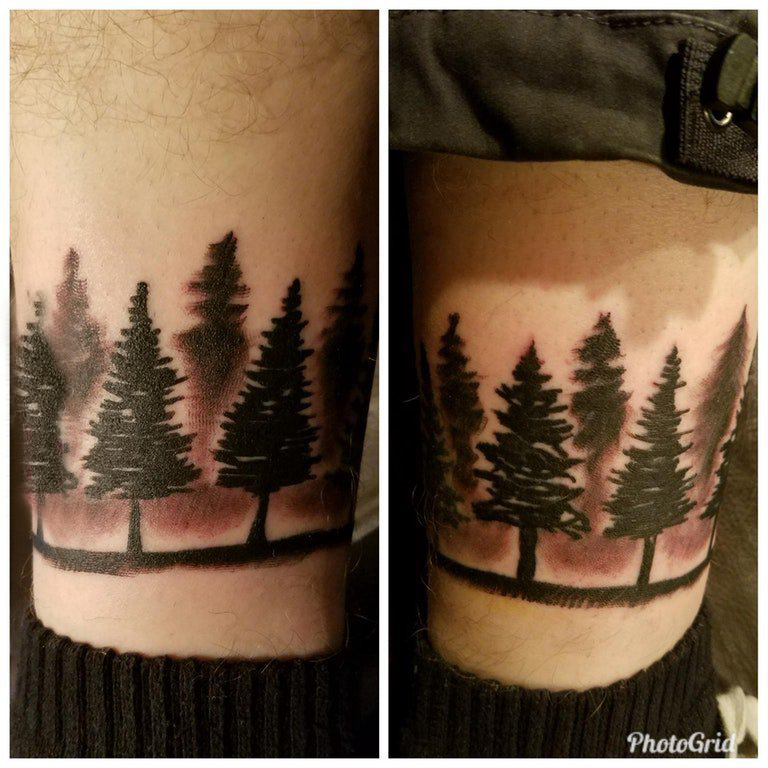 点击大图看下一张：树林纹身图案 男生小腿上黑灰的树林纹身图片
