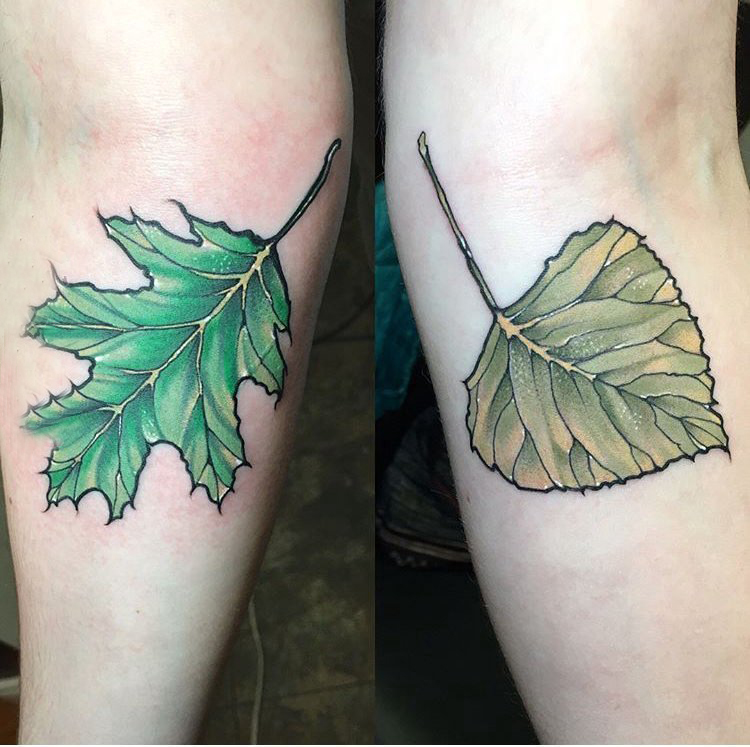 点击大图看下一张：树叶纹身图 女生手臂上彩色的树叶纹身图片