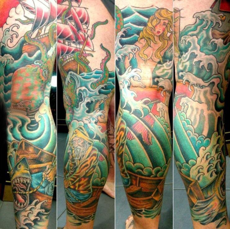 点击大图看下一张：大海风景纹身  男生腿上彩绘的大海风景纹身图片