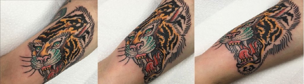 点击大图看下一张：纹身老虎  男生手臂上彩绘的老虎纹身图片
