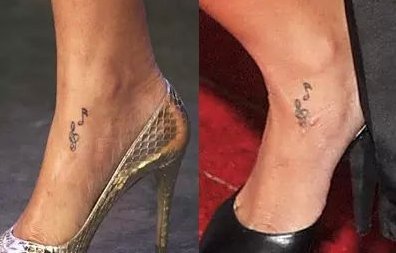 点击大图看下一张：蕾哈娜的纹身   明星蕾哈娜脚上黑色的音符纹身图片