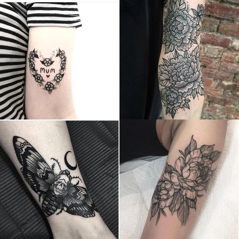 点击大图看下一张：纹身图案女生手臂  女生手臂上黑灰的花朵纹身图片