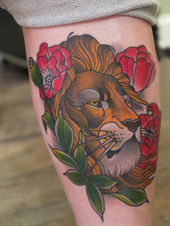 点击大图看下一张：狮子王纹身  女生小腿上彩绘的狮子王纹身图片