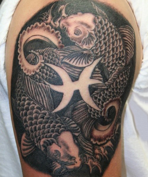 点击大图看下一张：纹身双鱼座  具有神秘意味的星座纹身图案