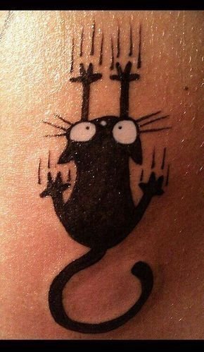 点击大图看下一张：小清新猫咪纹身  女生手臂上黑色的猫咪纹身图片