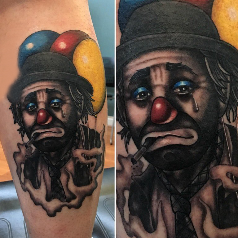 点击大图看下一张：小丑纹身  男生小腿上悲伤的小丑纹身图片