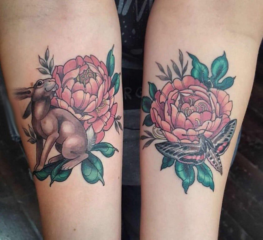 点击大图看下一张：纹身图案花朵  女生手臂上花朵和兔子纹身图片