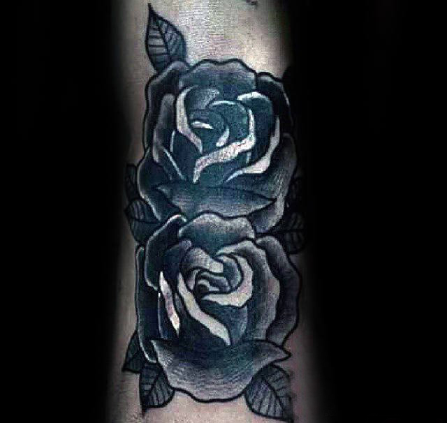 点击大图看下一张：黑玫瑰纹身图案  沉闷却不失美丽的黑玫瑰纹身图案