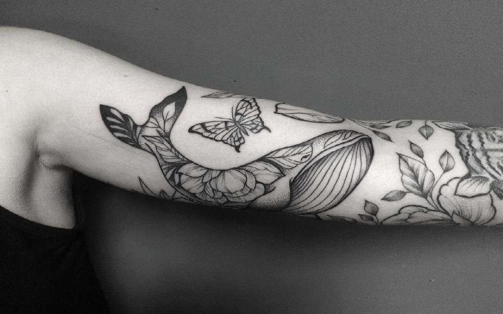 点击大图看下一张：百乐动物纹身 男生手臂上蝴蝶和鲸鱼纹身图片