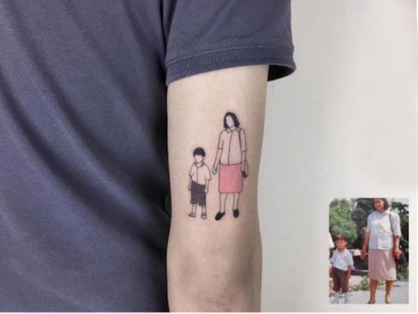点击大图看下一张：纹身照片 男生手臂上彩色的照片纹身图片