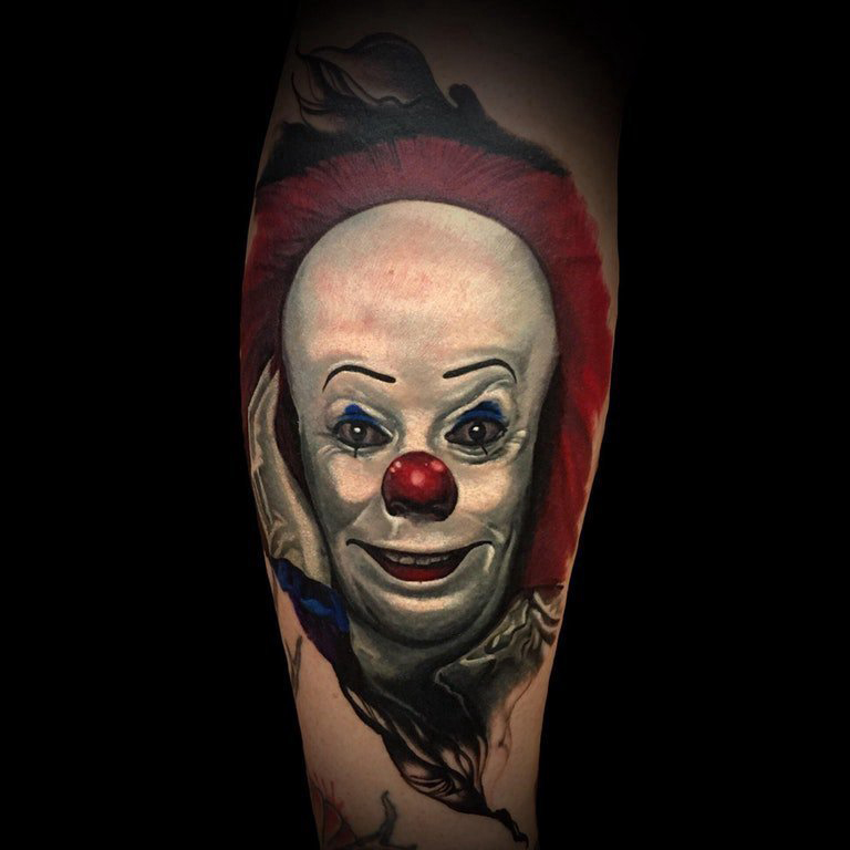 点击大图看下一张：小丑纹身 男生手臂上逗趣的小丑纹身图片