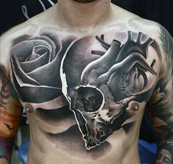 点击大图看下一张：纹身胸部男 男生胸部玫瑰和骷髅纹身图片