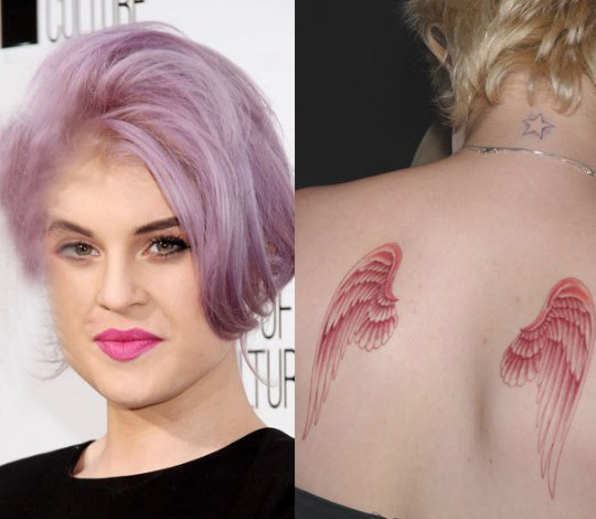 点击大图看下一张：美国纹身明星  凯莉·奥斯本后背上彩绘的翅膀纹身图片