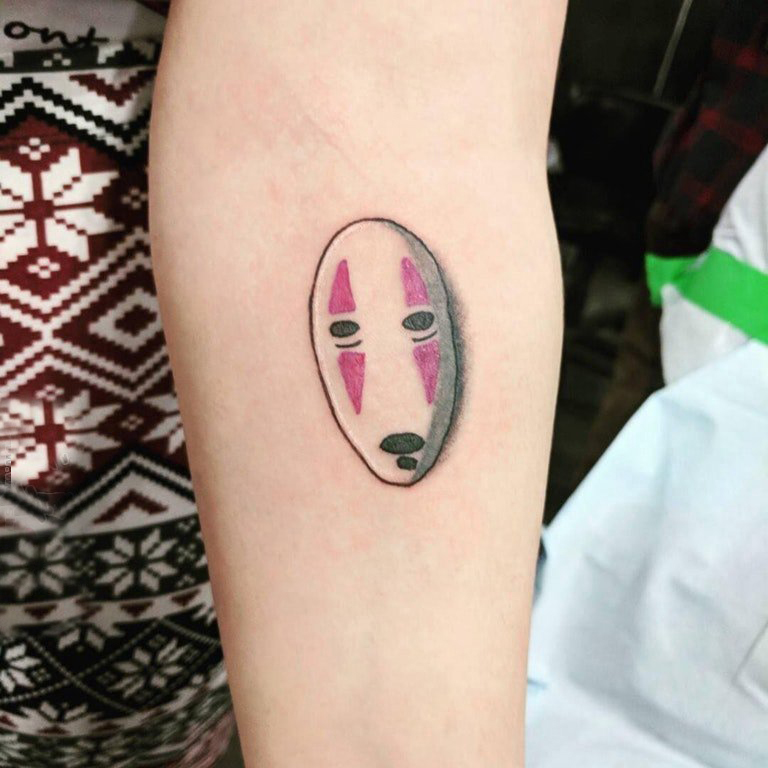 点击大图看下一张：纹身面具 女生手臂上彩色的面具纹身图片