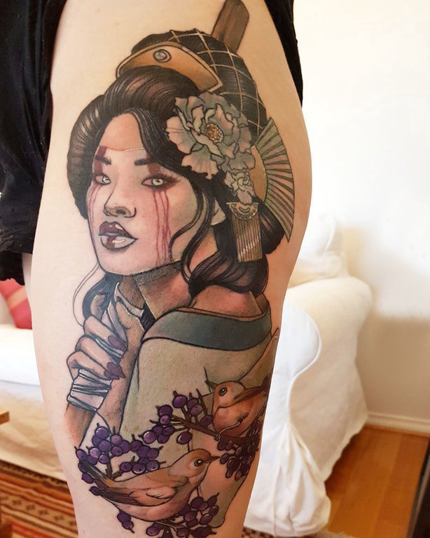 点击大图看下一张：日本艺妓纹身图片 女生大腿上鸟和艺妓纹身