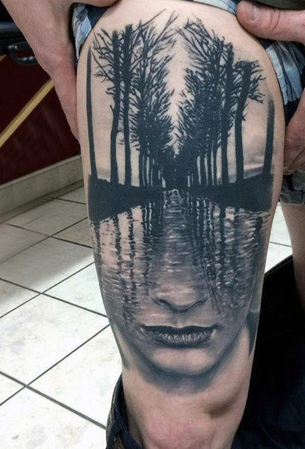 点击大图看下一张：大腿纹身男 男生大腿上树林和人物纹身图片