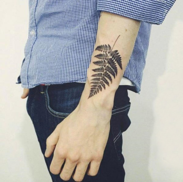 点击大图看下一张：手腕上纹身图案 创意绽放的手腕上纹身图案