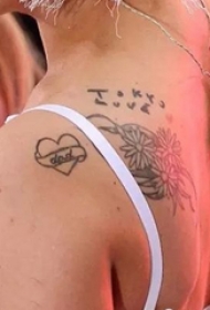 lady gaga的纹身  明星肩部小雏菊和心形纹身图片