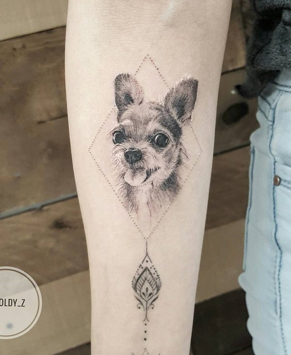 点击大图看下一张：乖巧可爱的宠物狗纹身图案