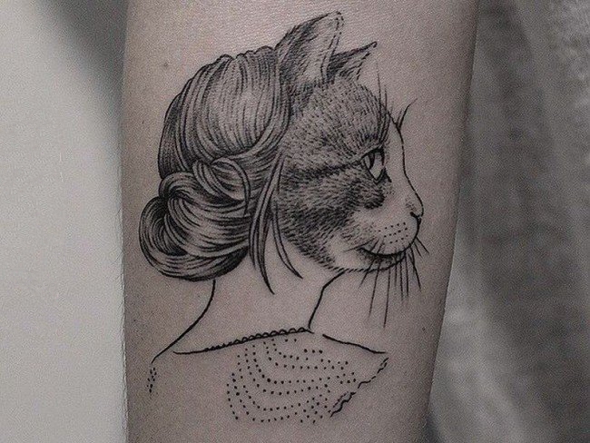 点击大图看下一张：小猫咪纹身  多款设计风格各异的小猫咪纹身图案