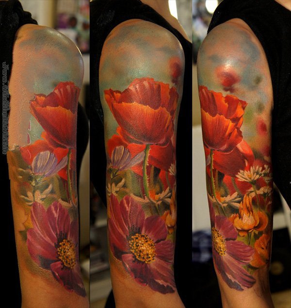 点击大图看下一张：罂粟花纹身图片  妖艳致命的罂粟花纹身图案