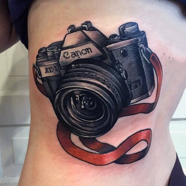 点击大图看下一张：照相机纹身   摄影爱好者奇趣的照相机纹身图案