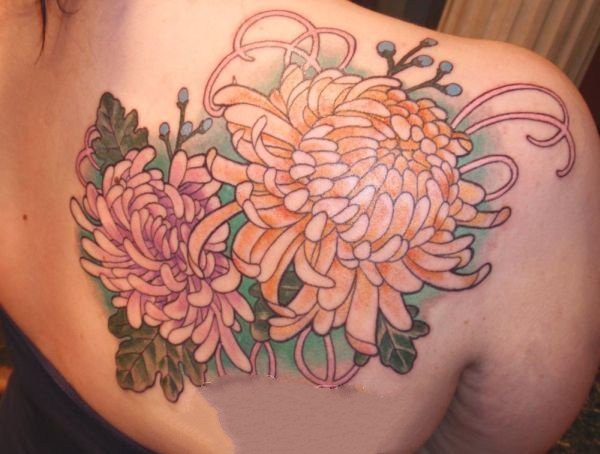 点击大图看下一张：纹身菊花图案   风格各异的菊花纹身图案