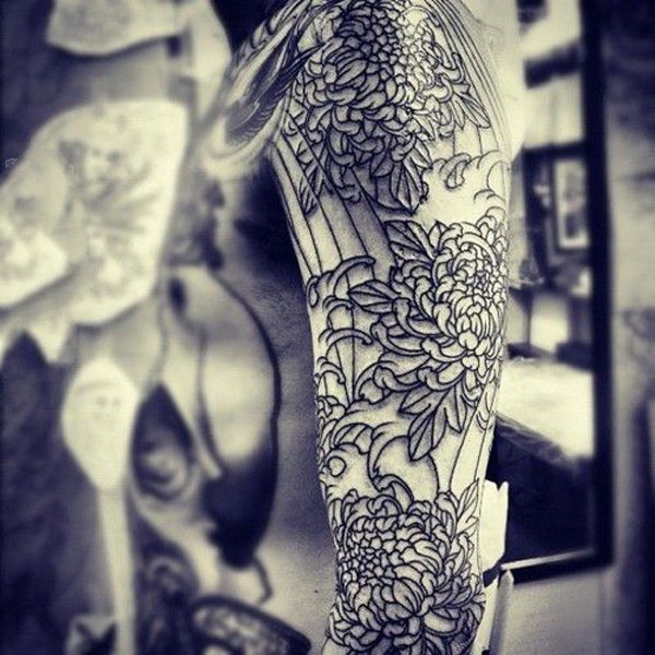 点击大图看下一张：纹身菊花图案   风格各异的菊花纹身图案