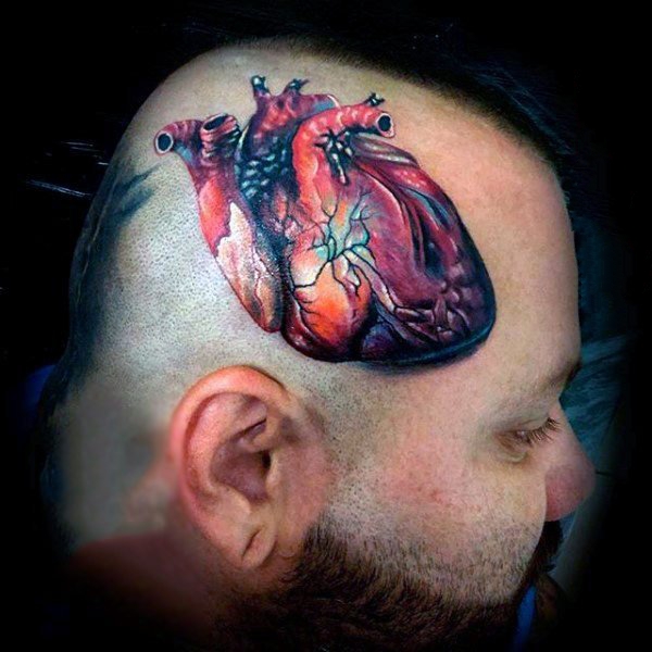 点击大图看下一张：心脏纹身图案   多款彩绘的心脏纹身图案