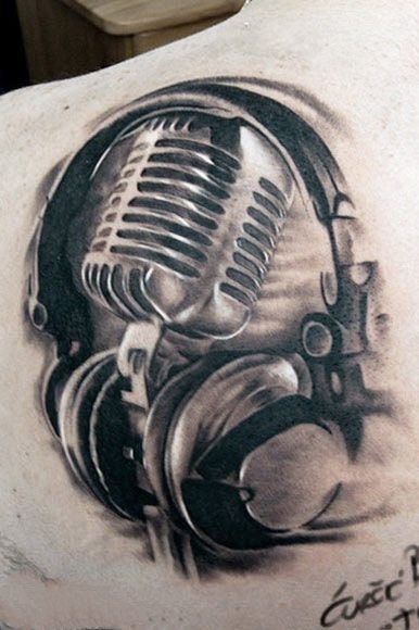 点击大图看下一张：音乐纹身图案 悦耳动听的乐器纹身图案
