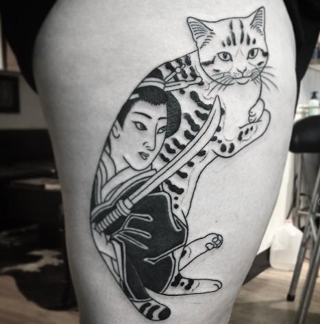 点击大图看下一张：小猫咪纹身  设计感十足的小猫咪纹身图案