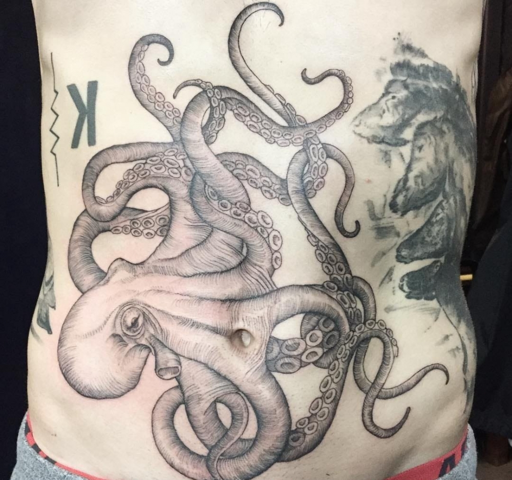 点击大图看下一张：章鱼纹身图案   多款趣味的章鱼纹身图案
