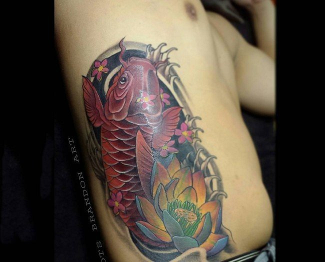 点击大图看下一张：纹身锦鲤图案   寓意及吉祥的锦鲤纹身图案