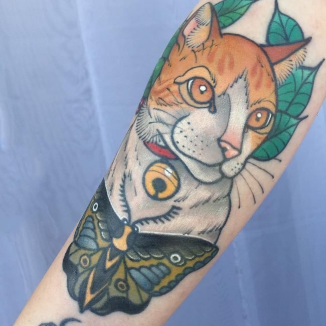 点击大图看下一张：猫咪纹身图案   优雅灵敏的猫咪纹身图案