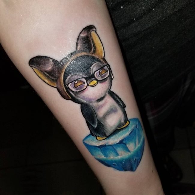 点击大图看下一张：小动物纹身  调皮可爱的企鹅纹身图案