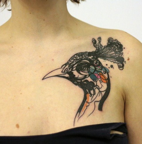 点击大图看下一张：孔雀纹身图片   唯美的孔雀纹身图案