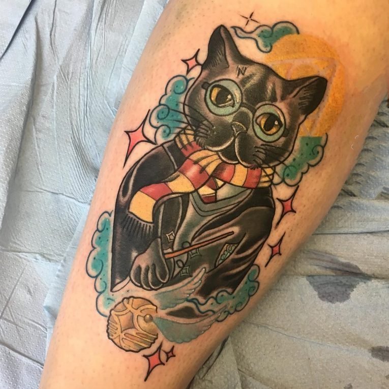 点击大图看下一张：猫咪纹身图案  乖巧可爱的猫咪纹身图案