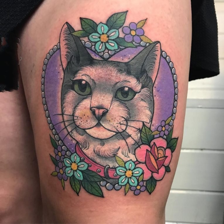 点击大图看下一张：猫咪纹身图案  乖巧可爱的猫咪纹身图案