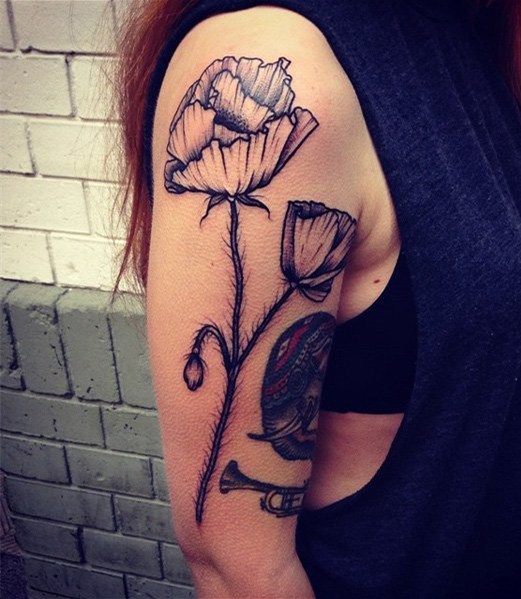点击大图看下一张：罂粟花纹身图片   鲜丽娇媚的罂粟花纹身图案