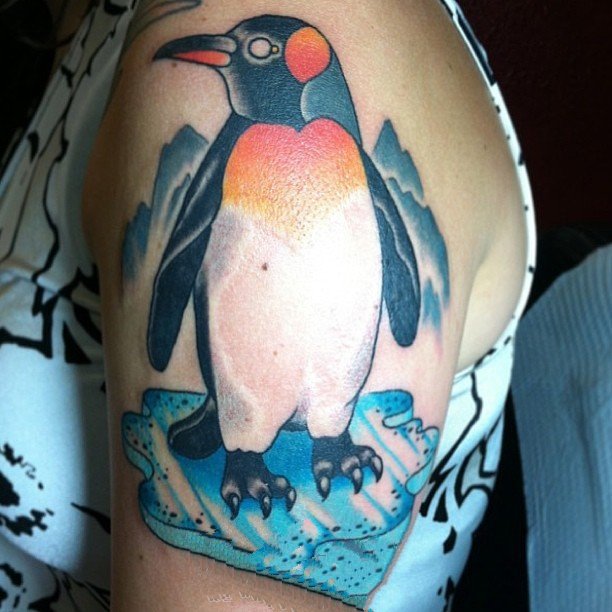 点击大图看下一张：企鹅纹身图    憨态可掬的企鹅纹身图