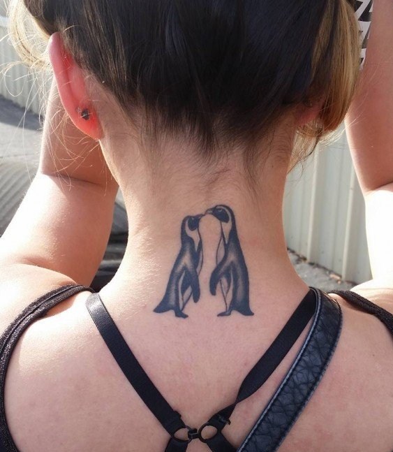 点击大图看下一张：企鹅纹身图    憨态可掬的企鹅纹身图